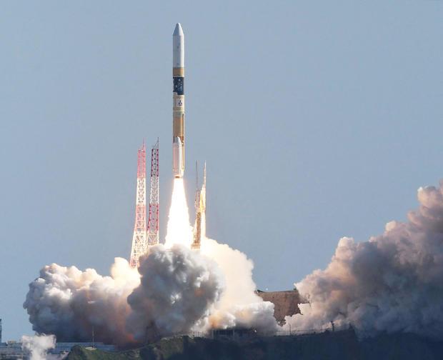 An H2-A rocket carrying a small lunar surface probe and other objects lifts off from the Tanegashima Space Centre on Tanegashima island, Kagoshima prefecture, Japan, on Sept. 7, 2023. The rocket is carrying what Japan hopes will be its first successful Moon lander. STR/JIJI PRESS/AFP VIA GETTY IMAGES